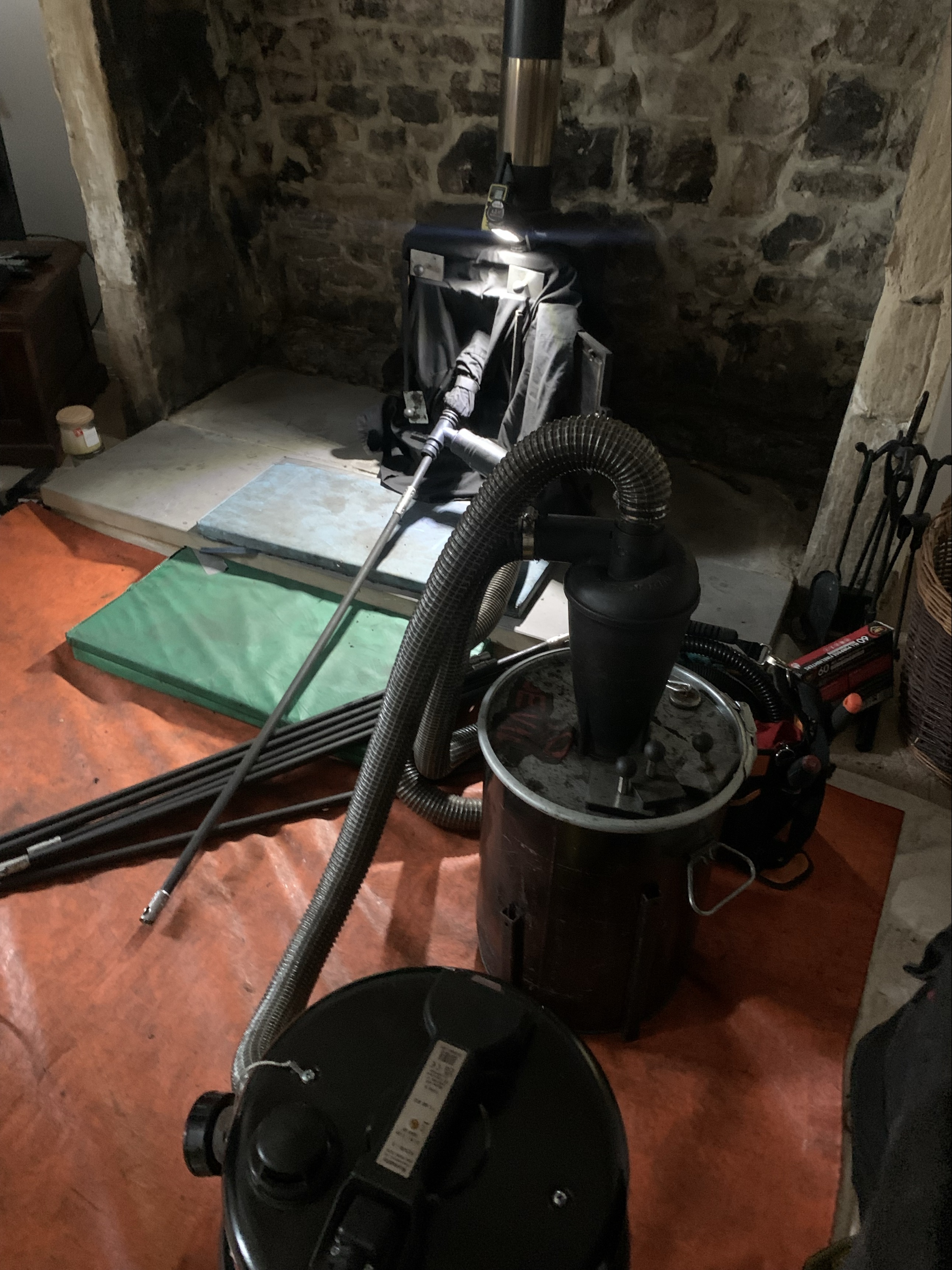 Sweeping unlined stove in Hexham